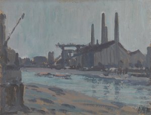 Landschap met industriële gebouwen bij een rivier